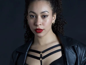 bdsm in berlin is a great experience with Goddess Nadirah, resident blackdomina in berlin at studio lux mz deep red lips entice